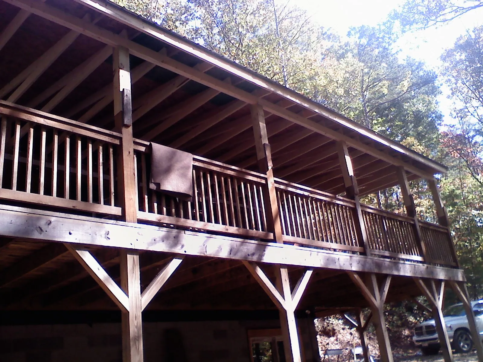 Timber framing under a new elevated porch and deck — Roof Leak Repair in Williamson by Roofing Brothers